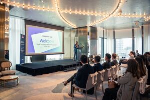 Speaker from Samsung presents a welcome message to audience members