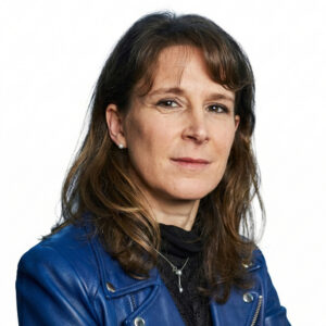 Caroline Hugonenc, SVP, Data & Insights at Teads, professional headshot with arms crossed, wearing a blue jacket against a neutral background.